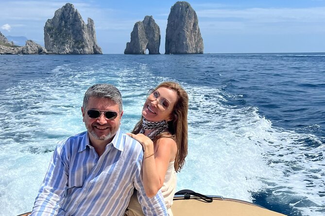 All-Inclusive Capri Boat Tour with City Visit from Positano - First coastline hits: Spiaggia Grande, Bagni di Tiberio, and Punta Carena