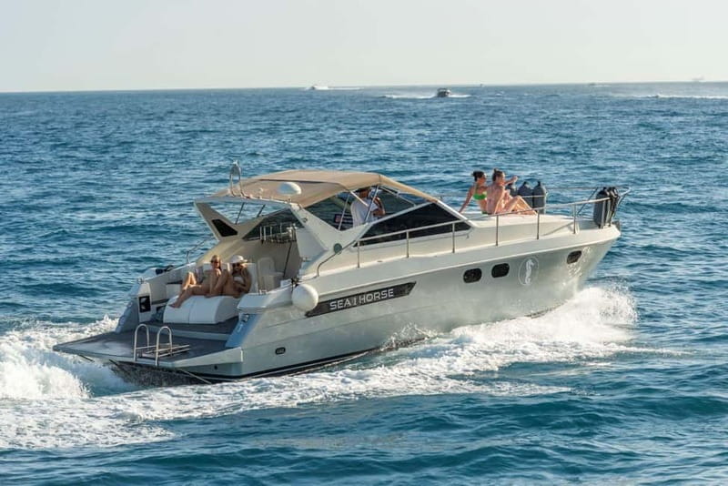 Amalfi: Boat Adventure Caves, Beaches, Snorkeling & Positano - Positano: the vertical city stop, shopping time, and the transfer fee reality