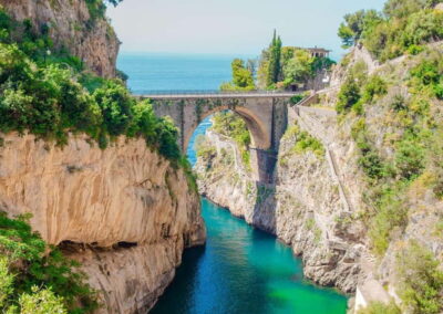 Amalfi Coast: Boat and Snorkeling Tour with Fruit & Drinks - The traditional Gozzo boat: shade, shower, and real practicality