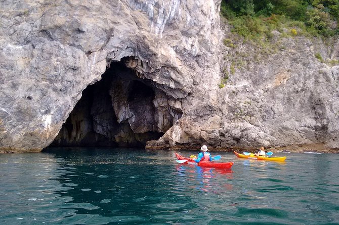 Amalfi Coast Kayak Tour: Explore Caves, Arches & Hidden Beaches - Runghetiello Grotto: red-green fresco walls and a sea-cave feel