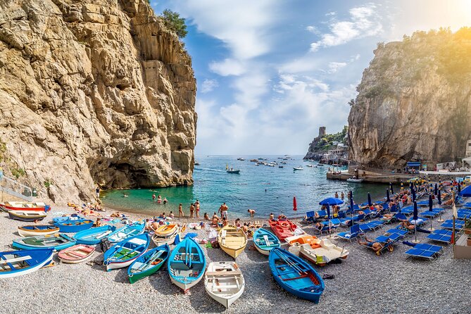 Amalfi Coast & Positano: Boat Tour with Snorkeling & Drinks - Stop 4 in Praiano: Africana Grotto and the blue-water lighting effect