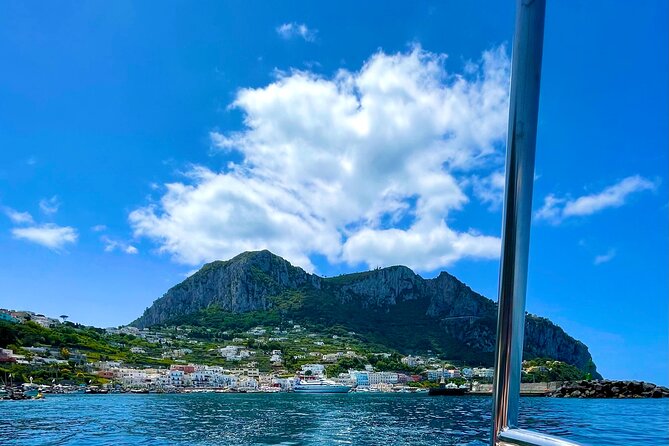 Boat Tour in Capri Italy - Your Capri route: Isola Azzurra, grottos, the red cliff villa, and Faraglioni