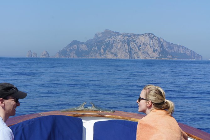 Capri & Blue Grotto Small Group Full-Day Boat Tour from Positano - Meeting at 8:00 AM: The Orange Booth Detail That Saves Your Day