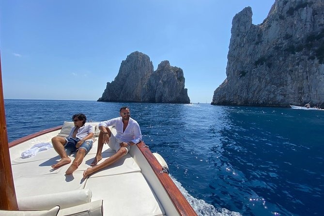 Capri Boat Tour: Grottoes, Swim & Sip Limoncello in a Small Group - Punta Carena Lighthouse: The Rocky Promontory Stop