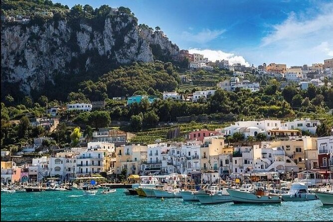 Capri Deluxe/First to Blue Grotto/from Sorrento Positano & Amalfi - Faraglioni and the Arch of Love: the iconic Capri moment