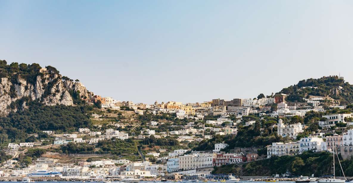 Capri: Island Boat Trip with Grottos - Faraglioni Rocks: the iconic sea stacks up close