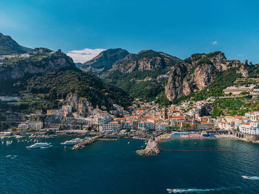 From Positano: Amalfi Coast Boat Tour with Swimming Stop - Emerald Grotto and Conca dei Marini: How the Boat Handles the Icons