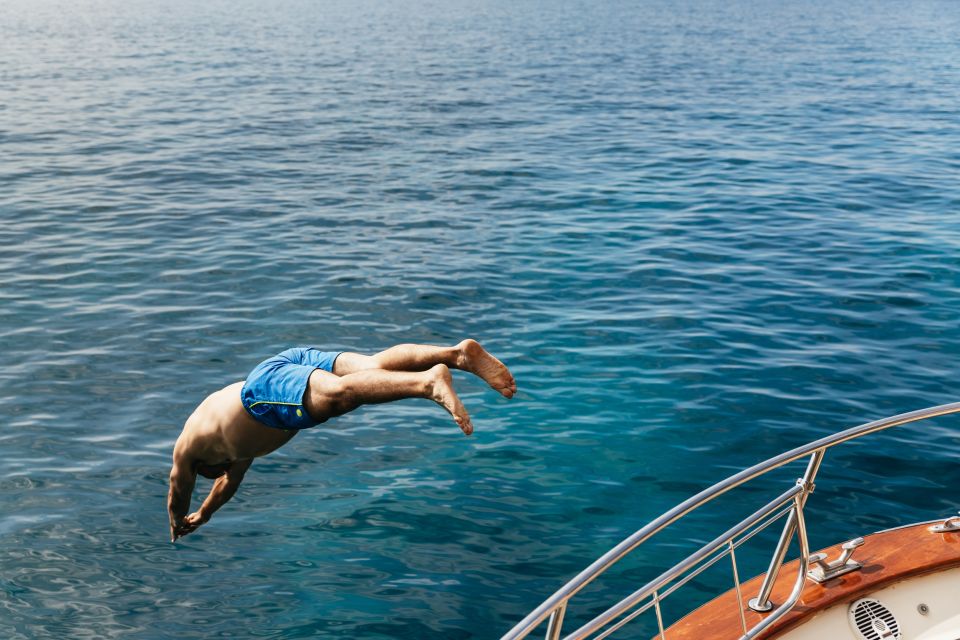 From Sorrento: Capri Boat Tour with Blue Grotto Visit - Onboard treats: Prosecco, beer, fruit, and a champagne tasting moment