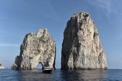 From Sorrento/Nerano:Capri Shared Tour (9:15am Boat Departure) - The boat circuit: grottos, Faraglioni, and Punta Carena views
