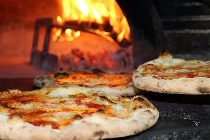 Pizza School Experience from Sorrento - Margherita by hand: building flavor with sauce and mozzarella