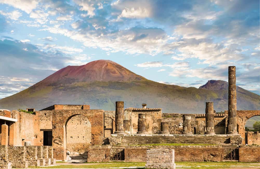 Pompeii: Group Tour with an Archeologist Guide - Baths, the main street, and theaters: Pompeii after civic life