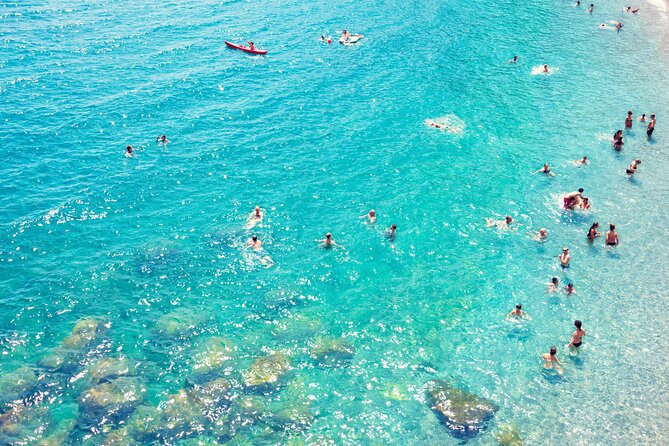 Positano & Amalfi Boat Tour from Sorrento: Swim & Light Lunch - Li Galli siren waters: your planned swim break