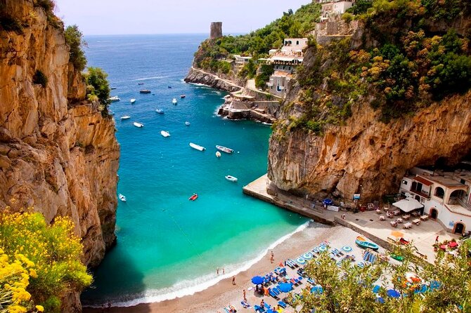 Positano & Amalfi Boat Tour from Sorrento: Swim & Light Lunch - Amalfi dock time: cathedral visits and lemon granita errands