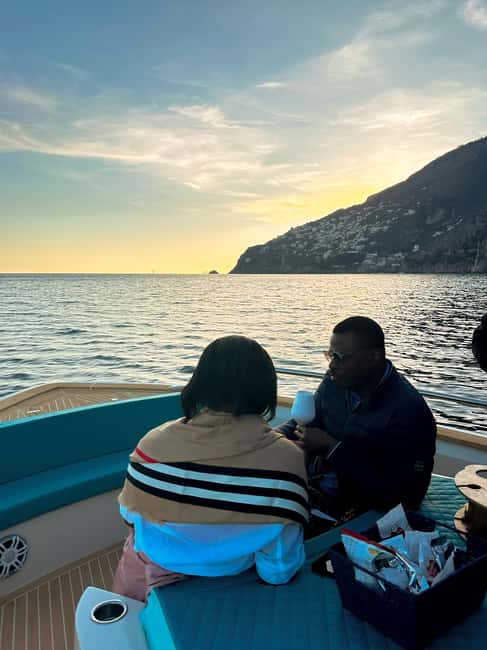 Positano: Shared Sunset Cruise - Snacks, WiFi, and the Prosecco-and-music vibe