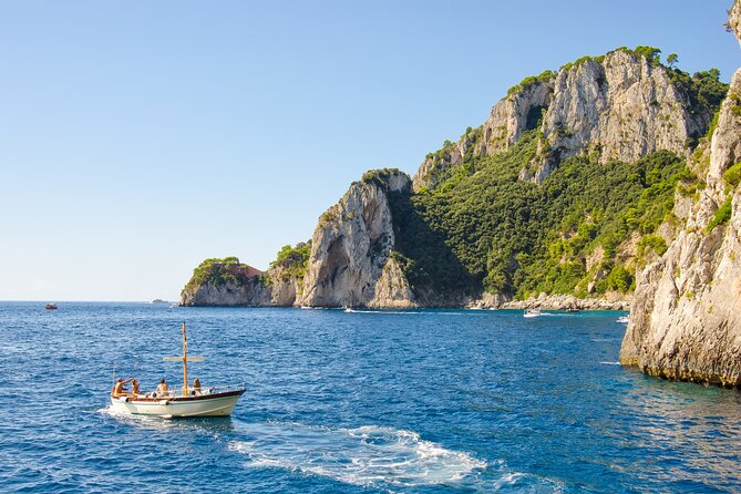 Private Tour: Amalfi Coast to Capri Cruise - Faraglioni and the rocks of Capri: the thrilling “through the hole” moment