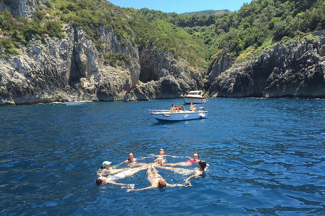 Private Tour: Amalfi Coast to Capri Cruise - Capri’s highlights from the water: harbor vibes, modern villas, and the pink-and-white lighthouse