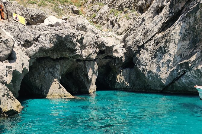 Private tour in a typical Capri boat - Swim stops and caves: Marina Piccola, Grotta Verde, and more time in the water