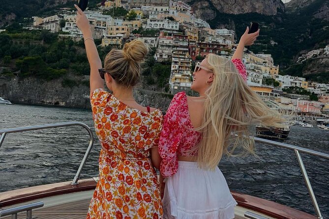 Shared Sunset Cruise from Positano with Drinks & Snacks 1.5-Hour - Drinks, snacks, towels, and snorkeling gear: what’s included and what to expect