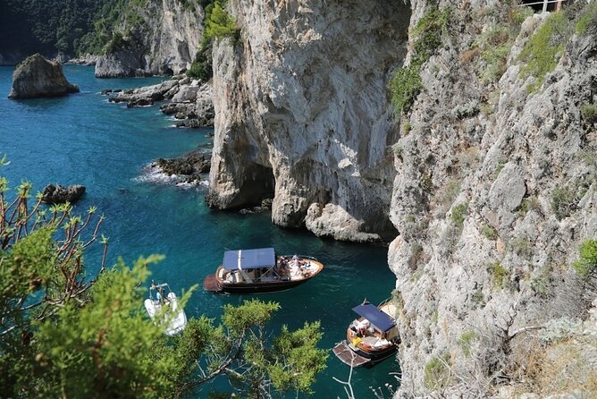 Small Group Boat Tour Capri & Blue Grotto with Swimming Stops - Food, open bar, and limoncello: why this boat trip feels like a treat