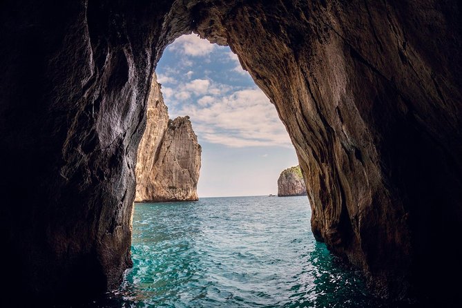 Small Group Capri Island Boat Ride with Swimming and Limoncello - Cruise views you’ll remember: caves, stacks, and lighthouse passes