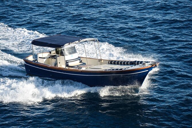 Small Group Day Trip to Capri from Positano or Praiano - Return to Positano or Praiano: Faraglioni views and a final swim
