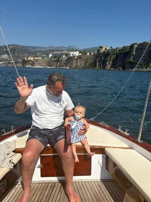 Sorrento: Boat Coastal Cruise with Swim and Limoncello - The boat experience: Gozzo Sorrentino views that feel close and personal